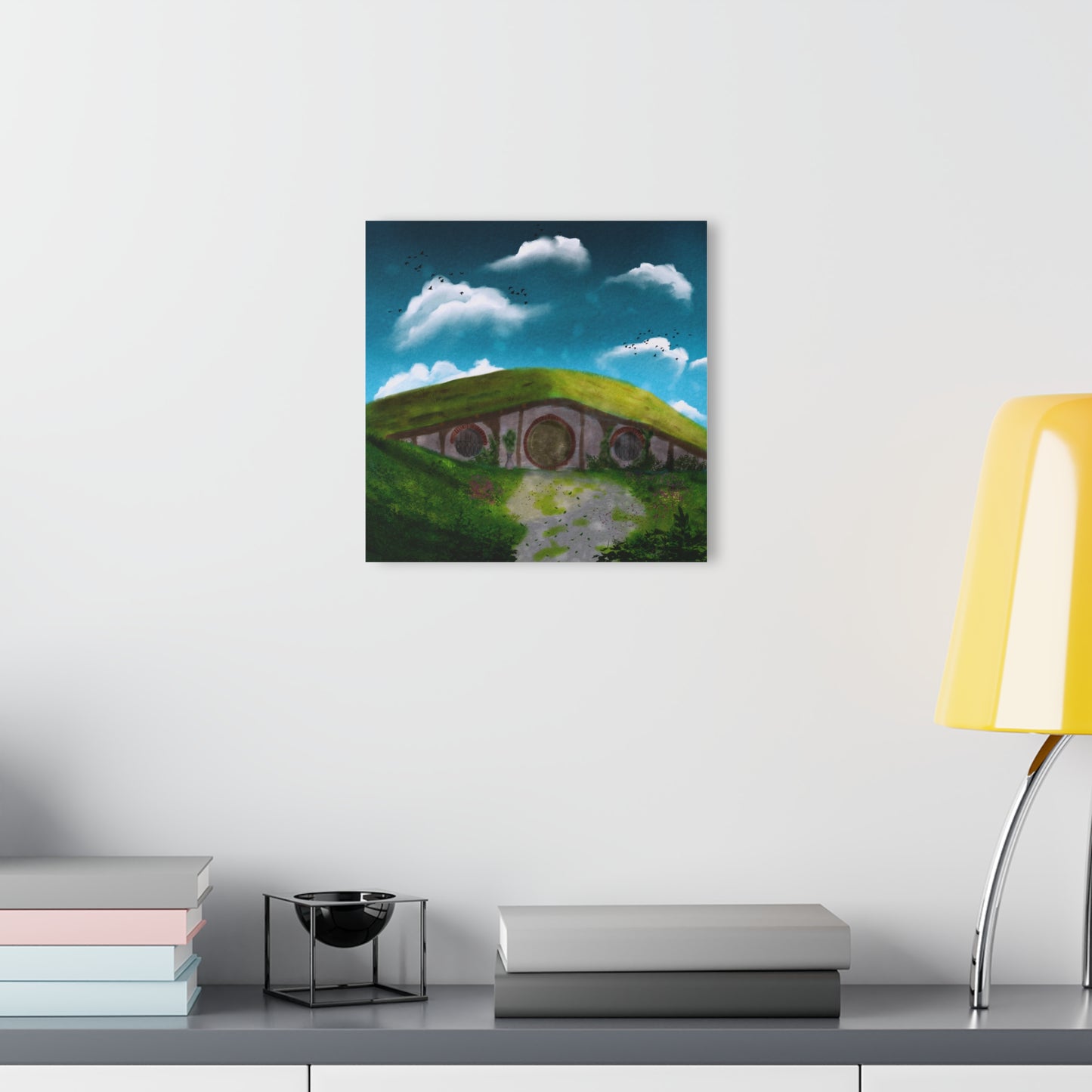 Hobbit House Fantasy Wall Art displayed in a cozy reading nook