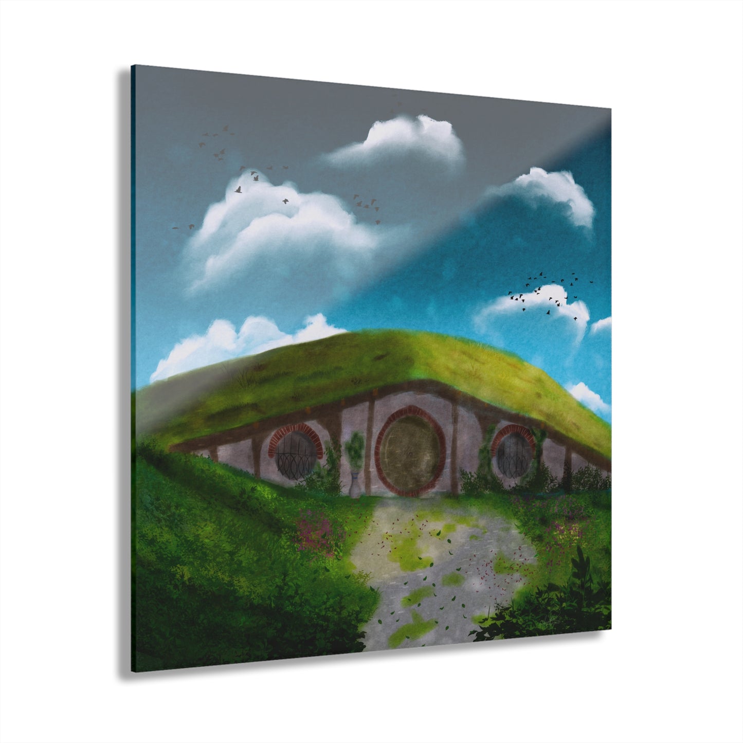 Close-up of acrylic print featuring whimsical hobbit home illustration